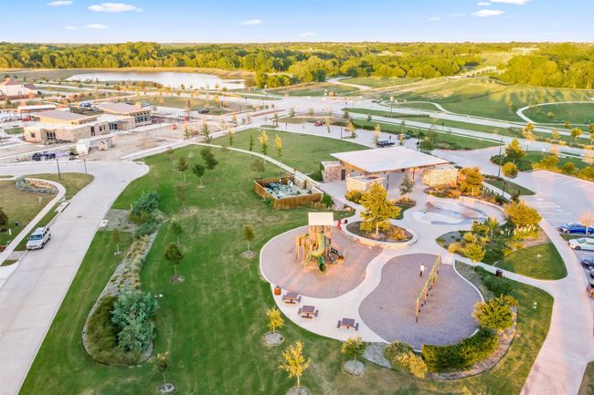 Aerial view of property and surrounding area with a large body of water | Image 38