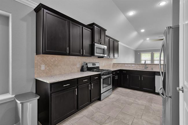 Kitchen view from the breakfast area | Image 15