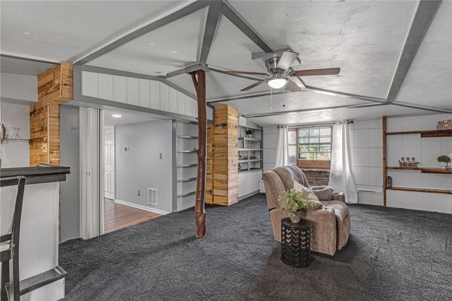The large family room is the perfect spot to host family & friends. | Image 14