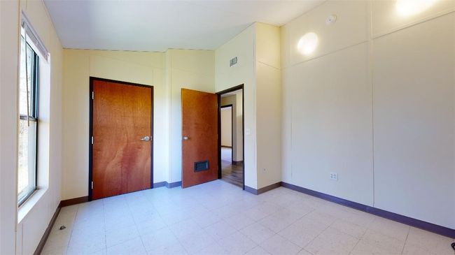 Unfurnished bedroom featuring baseboards | Image 47
