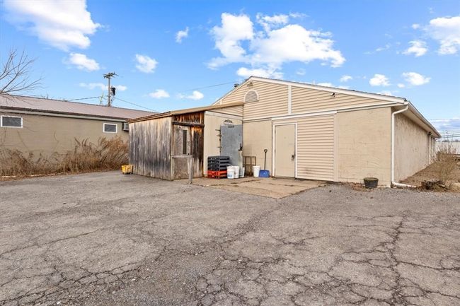 Rear of building with walk in included as is. | Image 16