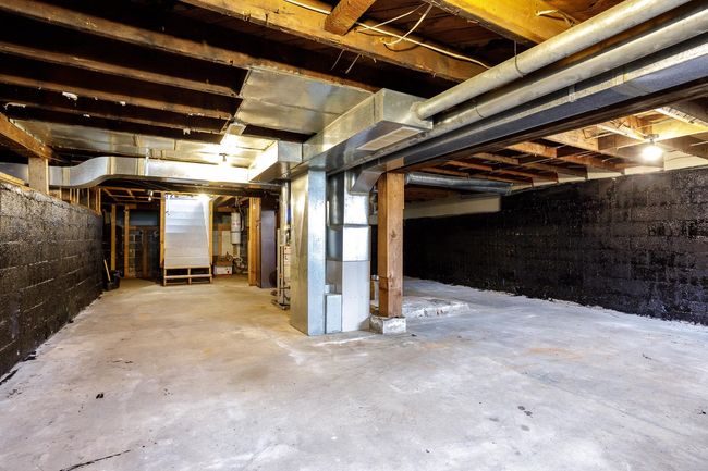 Unfinished basement with heating unit | Image 31