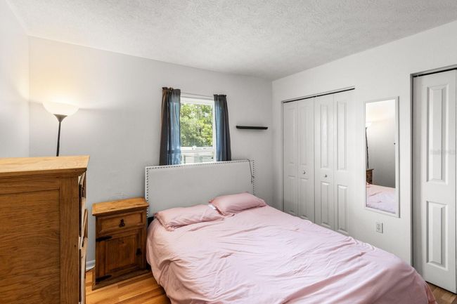 Bedroom 3 w/ 2 sets of Double BiFold Doors | Image 35