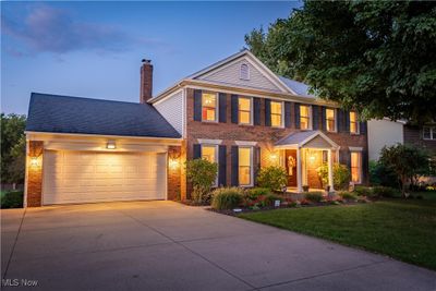 Colonial home with a lawn and a​​‌​​​​‌​​‌‌​‌‌​​​‌‌​​‌‌​‌​​​​​‌ garage | Image 2