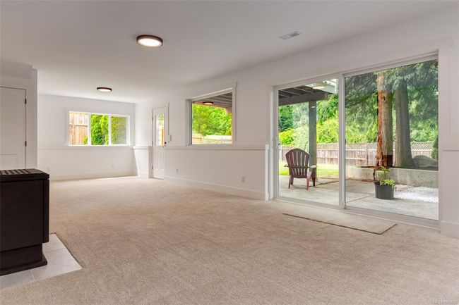 Rec Room with fireplace and access to backyard patio space | Image 71