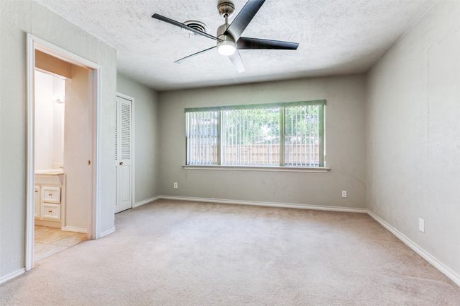 Bedroom works well as a Master or Guest Suite with Private Bath and Two Closets. | Image 8