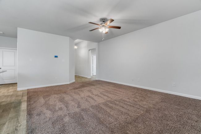 Spare room featuring baseboards and ceiling fan | Image 17