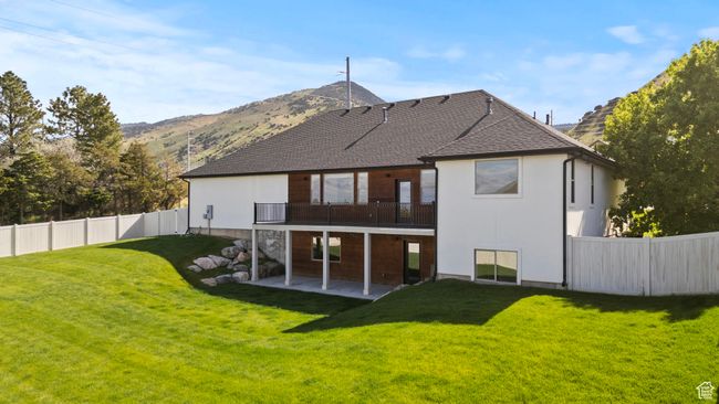 Back of house featuring a patio area and a mountain view | Image 47
