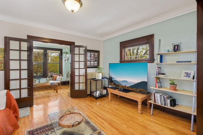 A view from the living room to the sunroom. | Image 8