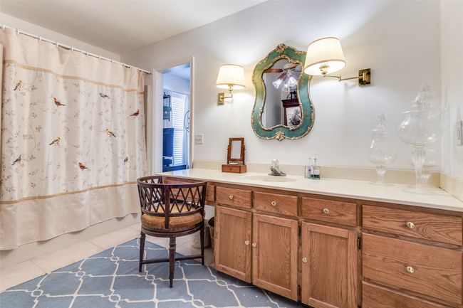 Full bathroom with vanity and tile patterned flooring | Image 24