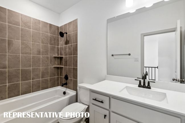 Friends and family will feel right at home in the lovely guest bath in our Conley plan. REPRESENTATIVE PHOTO | Image 15