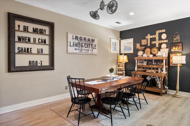Dining area featuring wood finished floors, ornamental molding, baseboards, and recessed lighting | Image 11