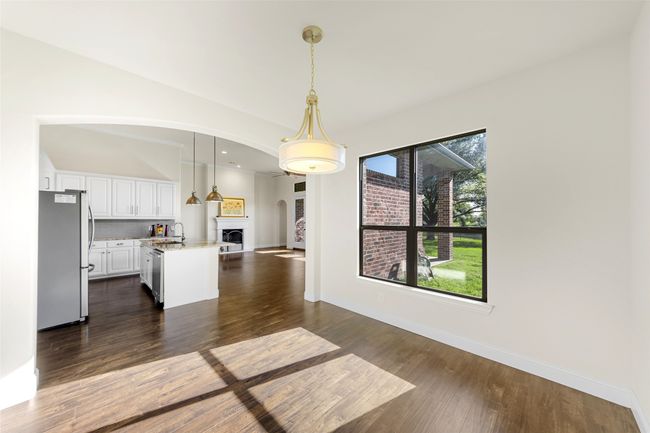 Separate large breakfast room for those causal meals with view to backyard too! | Image 16