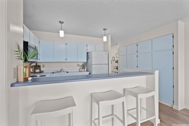 Lots of storage/cabinet space in the kitchen area. | Image 9