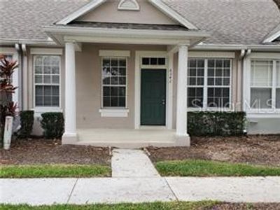 6542 Merrick Landing Boulevard, Townhouse with 3 bedrooms, 3 bathrooms and null parking in Windermere FL | Image 1