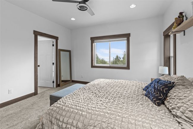 Carpeted bedroom featuring recessed lighting, a ceiling fan, and baseboards | Image 26