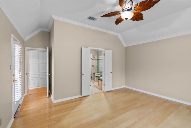 Hall into Primary and Entrance to primary bath | Image 34