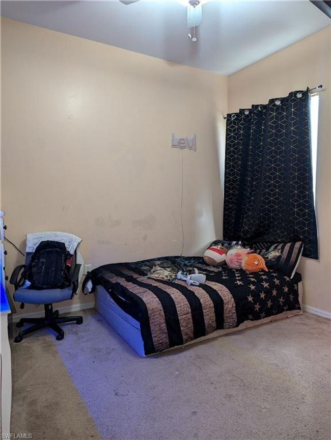 Carpeted bedroom featuring baseboards and ceiling fan | Image 17