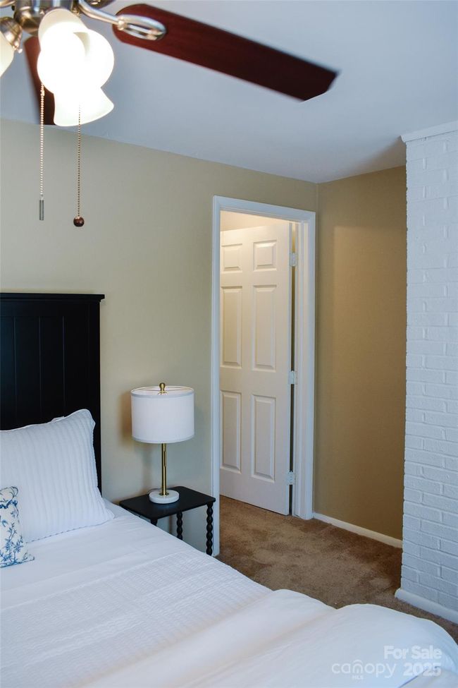 Entrance to primary walk in closet on the far right | Image 17