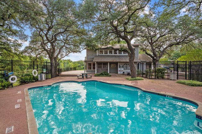 Community pool with a patio | Image 13
