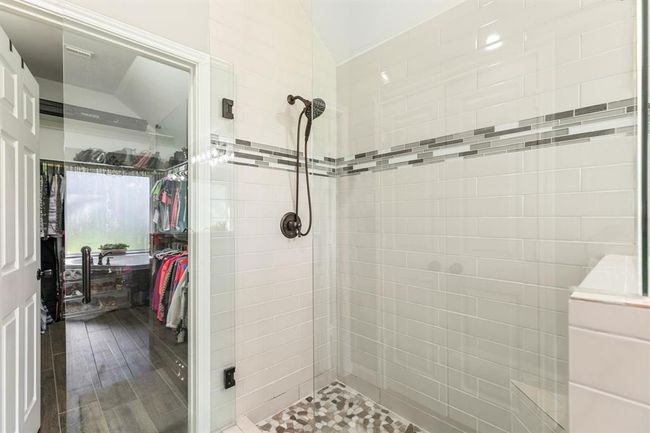 A view of the oversized walk in shower. | Image 29