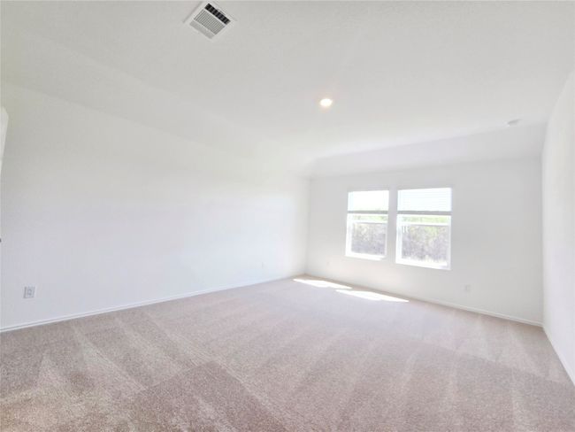 Carpeted empty room featuring baseboards and recessed lighting | Image 17