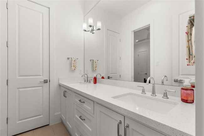 Jack-n-jill bath between two secondary bedrooms. | Image 40