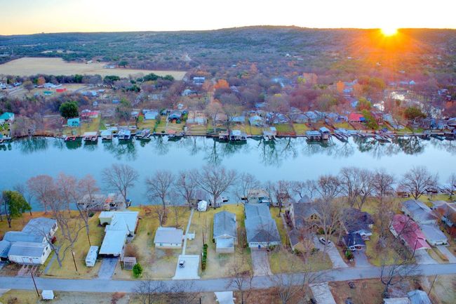 Aerial view at dusk featuring a residential view and a water view | Image 34