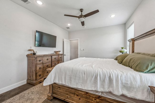 Carpeted bedroom featuring baseboards, recessed lighting, and ceiling fan | Image 13