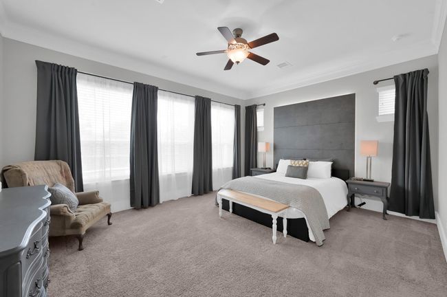 Primary bedroom overlooking pool and garden | Image 13