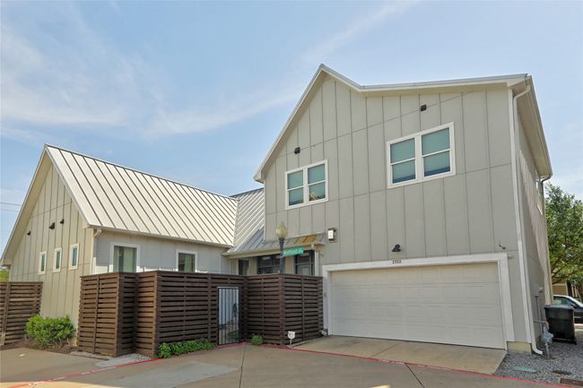 View of rear-entry garage and the fenced-in backyard. | Image 29