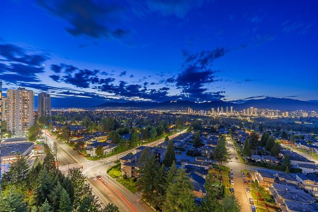 Aerial view of property's location with nearby urban area and mountains | Image 34