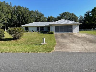 20225 Sw Beach Boulevard, House other with 3 bedrooms, 2 bathrooms and 2 parking in Dunnellon FL | Image 2