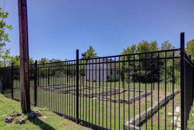 Fenced garden area awaits your culinary or decorative plantings! | Image 34