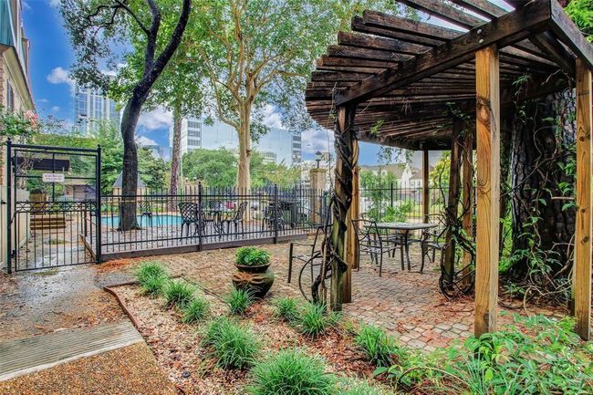 Pergola and grilling area next to the pool! | Image 12