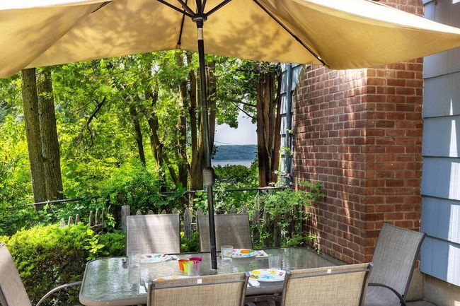 Patio with river view | Image 11