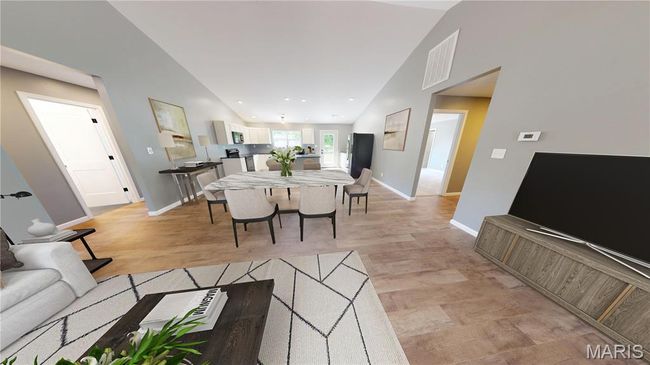 Living room with baseboards, light wood-type flooring, and recessed lighting | Image 9