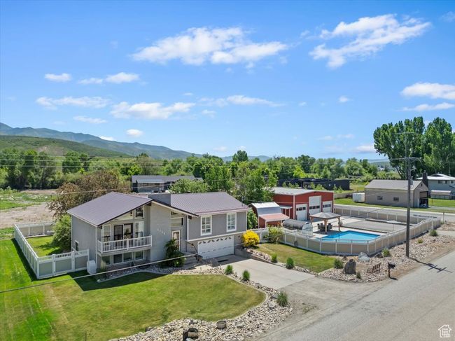 View from above of property with mountains and a pool | Image 39