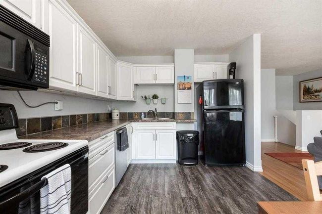 93 Simon Fraser Blvd W, Home with 4 bedrooms, 2 bathrooms and 3 parking in Lethbridge AB | Image 7