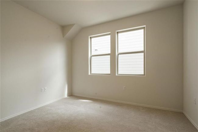 Carpeted spare room featuring baseboards | Image 15