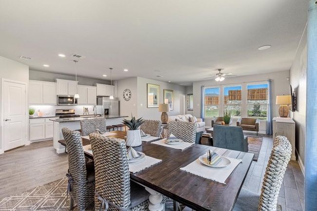 Dining area with recessed lighting, a ceiling fan, and wood finished floors | Image 10