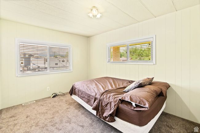 Bedroom featuring carpet flooring | Image 21