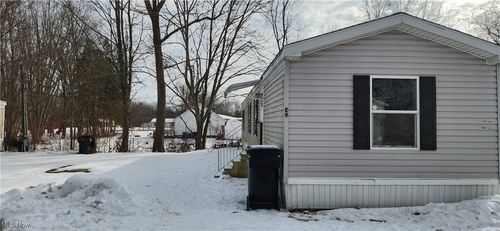 e9-5411 N River Road W, Geneva, OH, 44041 | Card Image