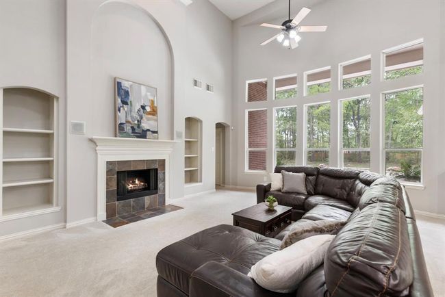 Door next to windows leads to the Primary Suite. | Image 11