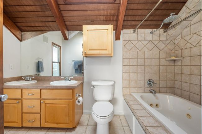 Dual Vanity and full bathtub/shower | Image 22