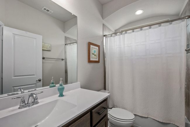 3rd Full Bathroom featuring vanity, toilet, shower / bath combo, and recessed lighting | Image 21