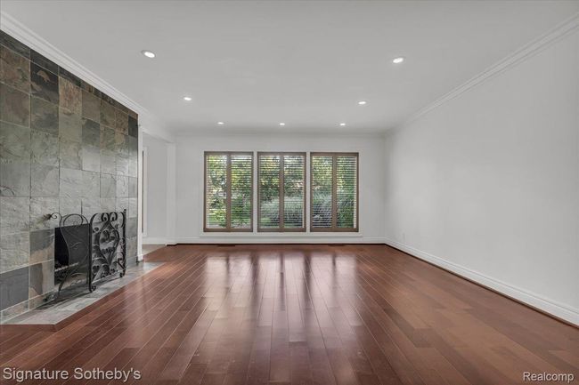 Family Room with Wood-Burning Fireplace | Image 7