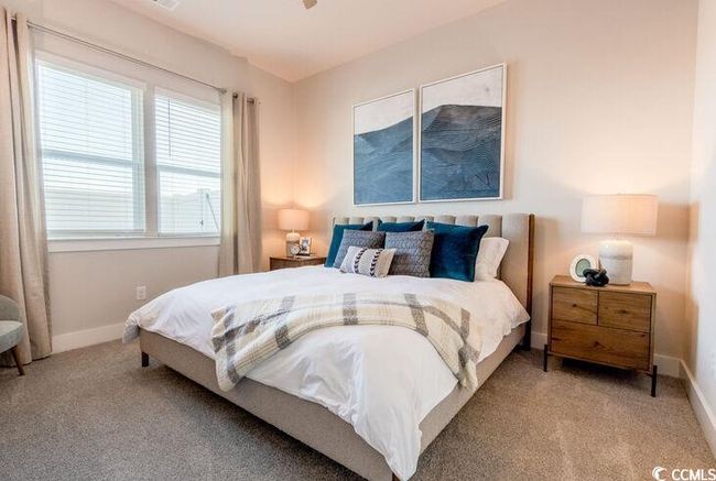 Bedroom with baseboards and carpet flooring | Image 15