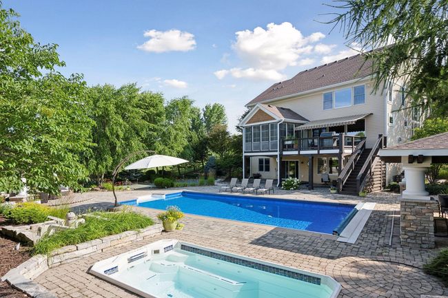 Swim spa is in the foreground. | Image 76