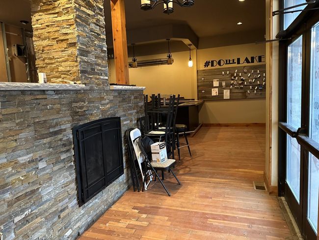 Front of fireplace and front entrance | Image 17